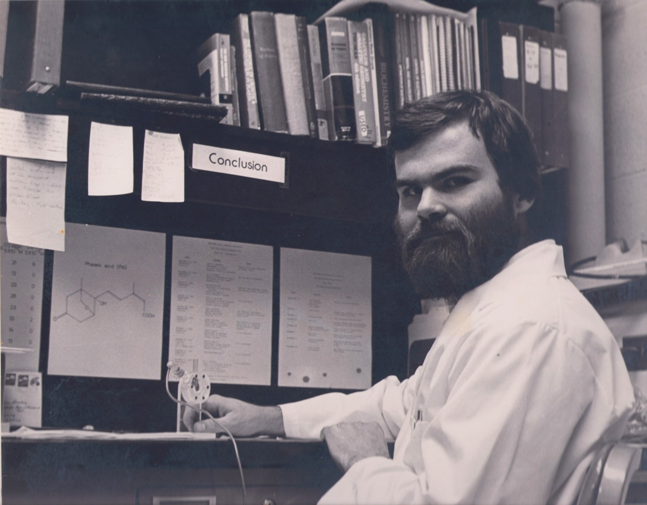 Tom Sharkey poses at his desk as a graduate student in the MSU-DOE Plant Research Laboratory between 1976-1980.