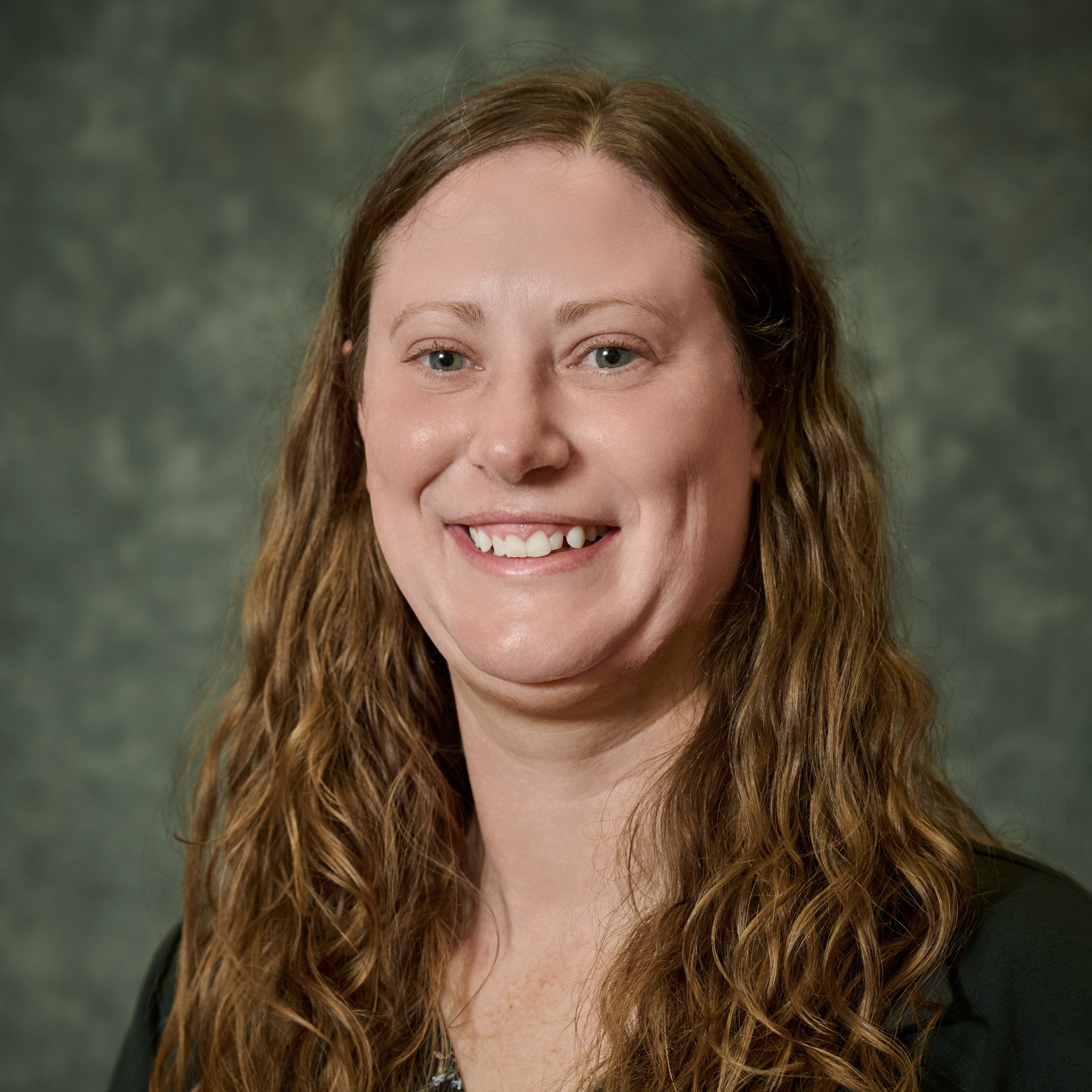 A headshot of Andrea Glassmire