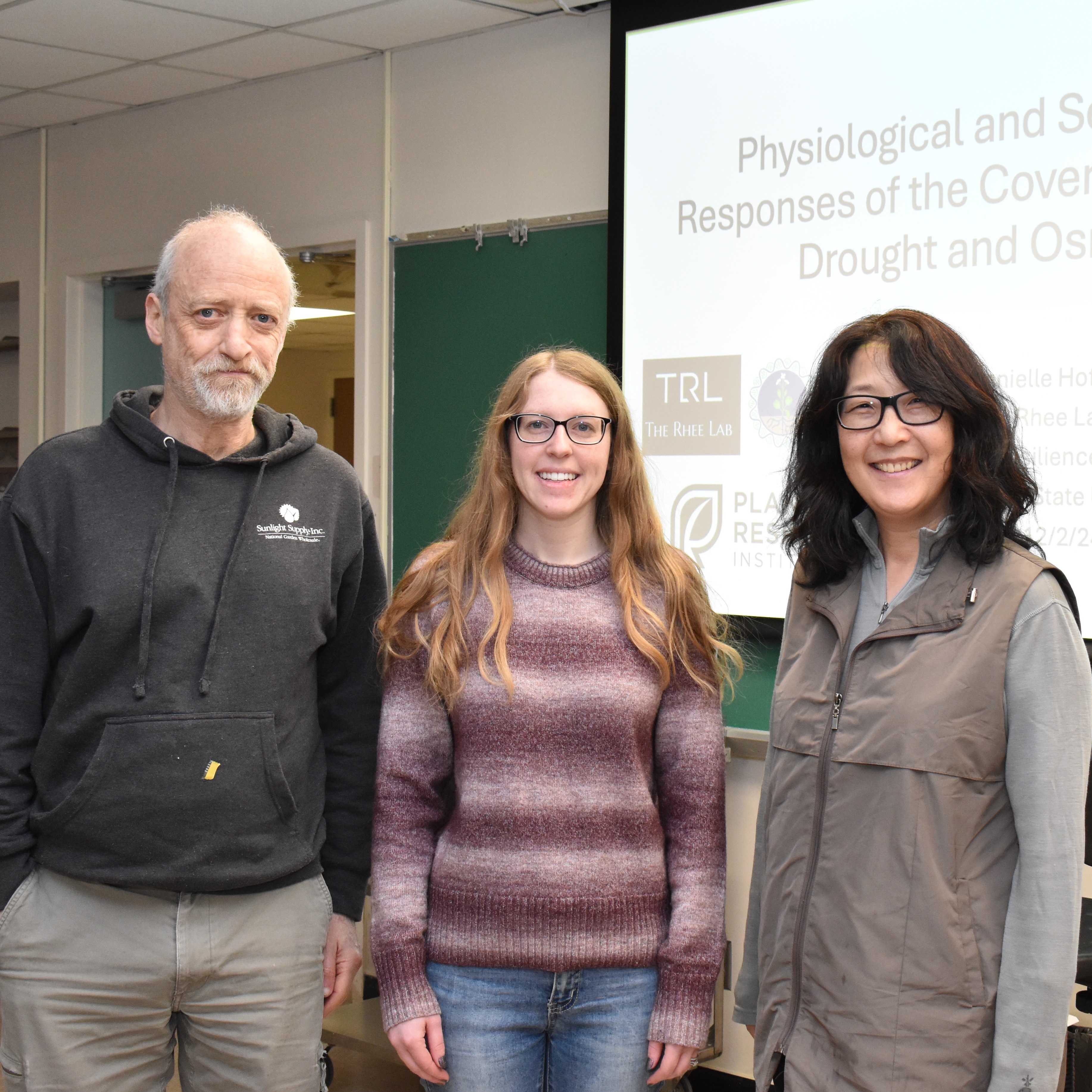 Danielle Hoffmann (center) with her mentors, Yair Shachar-Hill and Sue Rhee